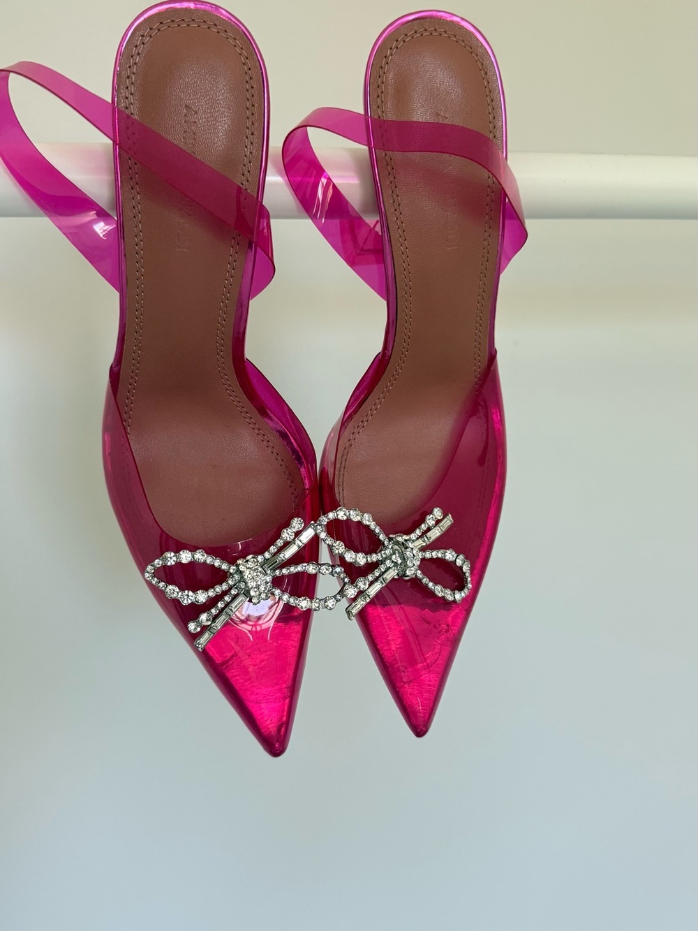 Amina Muaddi pink PVC begin heels